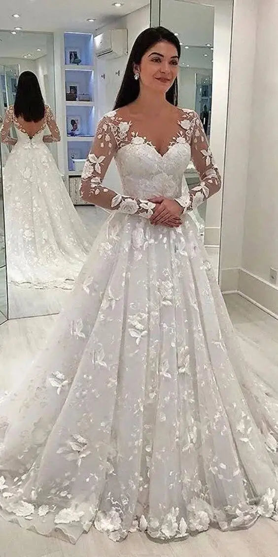Vestido de Noiva em Renda Manga Longa – Corte Princesa Elegante